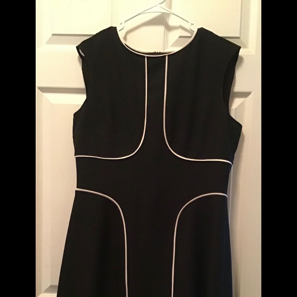 Woman’s black dress.